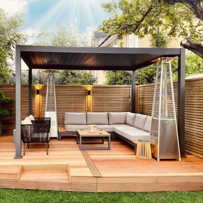 Freestanding Aluminium Pergola over an L shaped garden of and two heaters