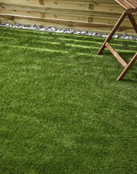 Deck chair placed on artificial grass